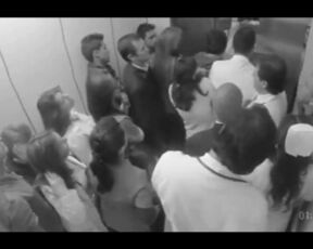 Doctor Groping Nurse In Elevator Full Of People