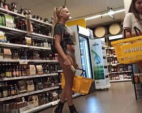 This girl loves to show her body in the supermarket