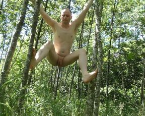 Kudoslong outside undresses and climbs the trees naked