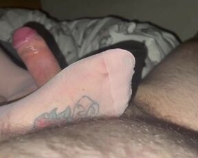 Beautiful feet rubbing throbbing cock