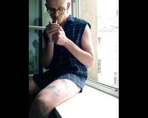 SHOWING OFF MY HARD COCK WHILE SMOKING IN THE WINDOW