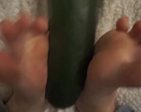 simulating footjob with an huge zucchini by a virgin cute girl