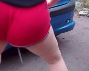 Just dancing in shorts near the car, moving my ass